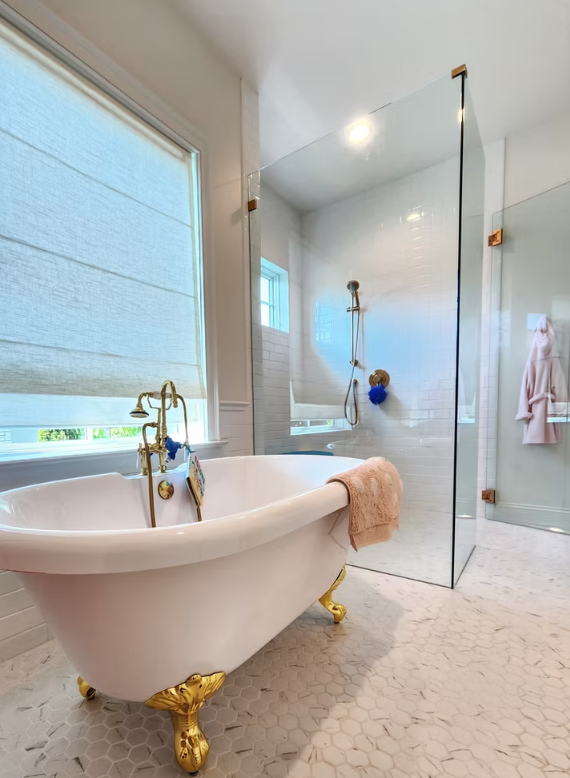 Walk-in shower with glass enclosure and modern tile, installed for a Seattle Madrona homeowner